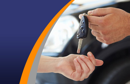 Car keys exchanging hands after car servicing from TC Motors Lincoln